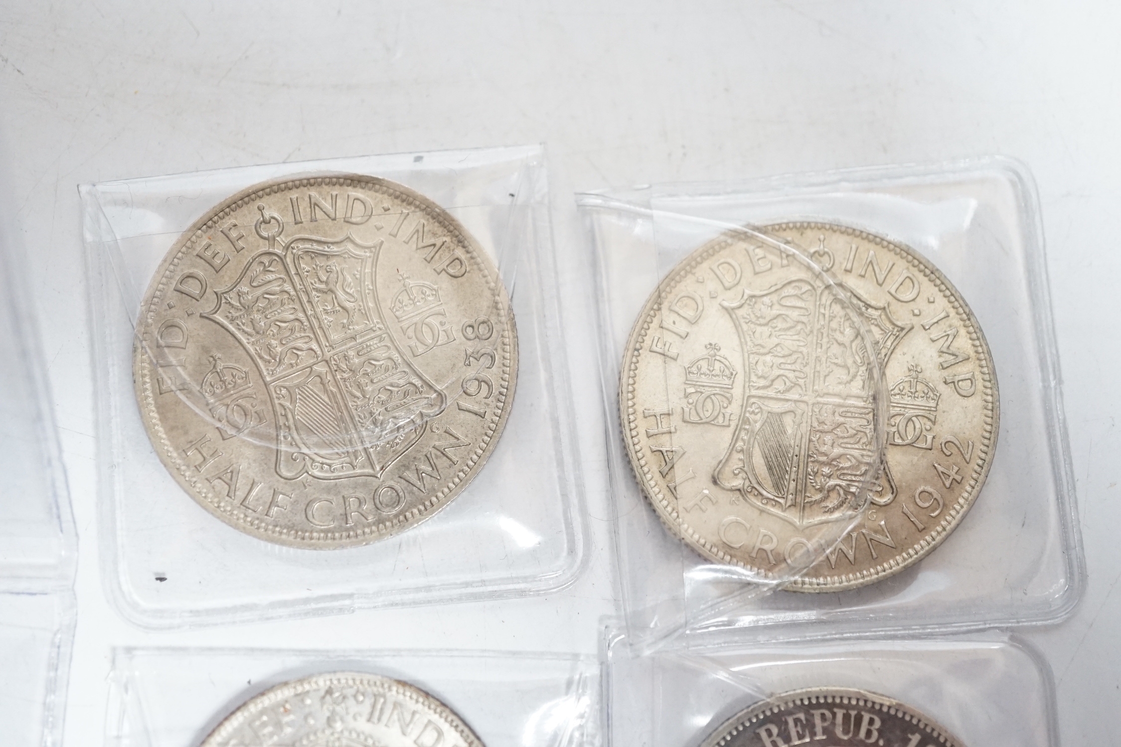 UK coins, 1938 and 1942 half crowns, 1736 farthing, 1806 penny, 1942 and a ZuidAfrica 2 shillings